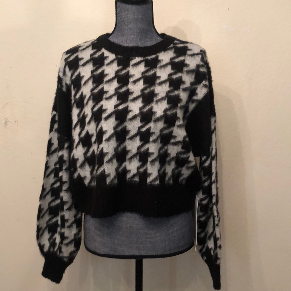 Fuzzy black and white sweater